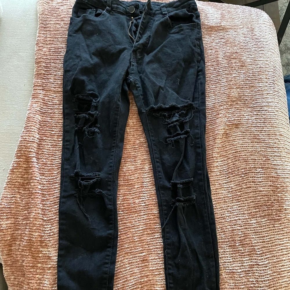 Small black ripped jeans